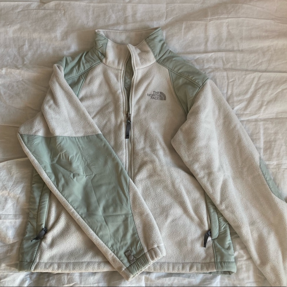 white north face zip up jacket